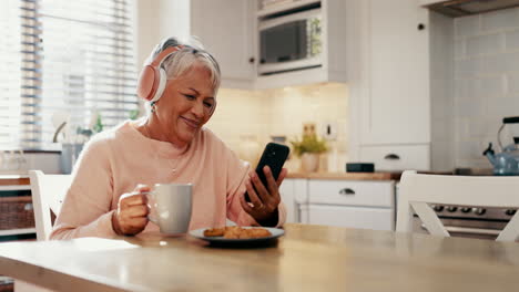 Headphones,-cellphone-and-senior-woman