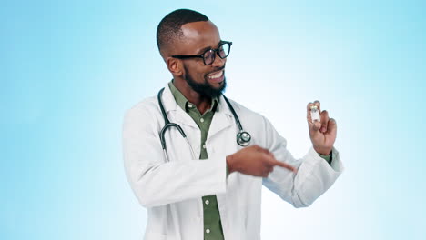 Black-man,-doctor-and-pointing-to-vaccine