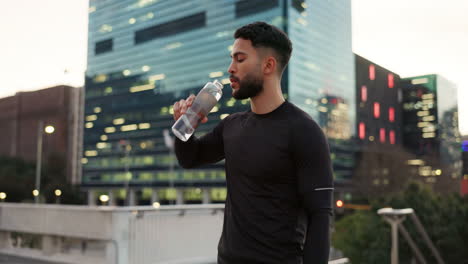 Wellness,-fitness-and-drinking-water-with-man