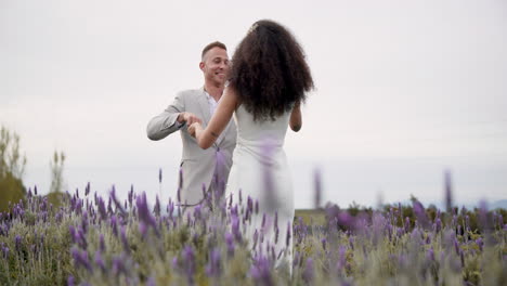 Wedding,-nature-and-happy-couple-in-garden-dancing