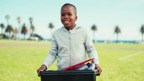 Happy-black-child,-bin-and-recycling-in-nature