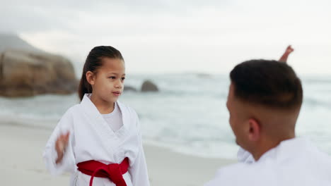 Beach,-karate-teacher-or-kid-with-high-five