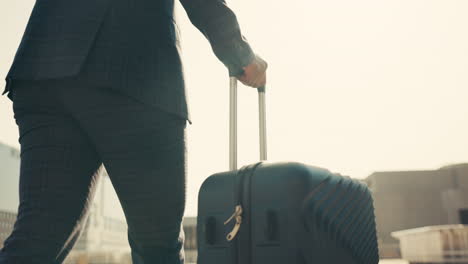 Back,-hand-and-travel-suitcase-for-person-on-walk