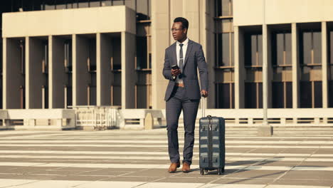 Business-man,-suitcase-and-phone-for-walk