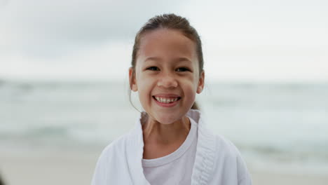 Kid,-laugh-and-happy-at-beach-in-portrait