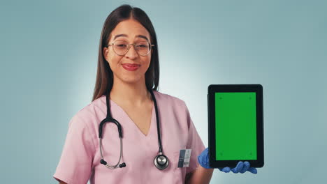 Portrait-of-nurse,-thumbs-up-with-tablet