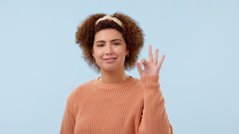 Woman,-OK-hand-sign-and-face-with-agreement