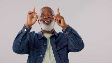 Advertising,-happy-and-mature-black-man-pointing