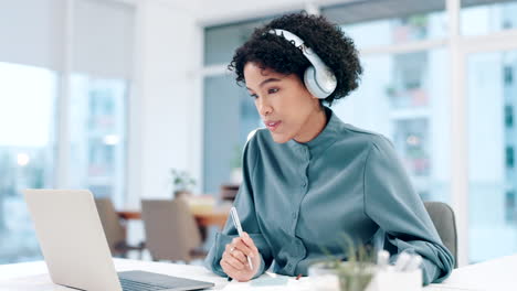 Business,-headphones-and-woman-with-a-laptop