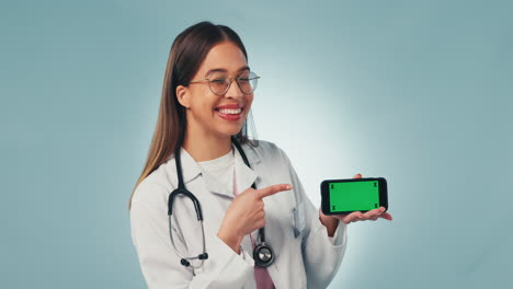 Portrait,-woman-doctor-pointing-at-phone