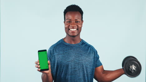 Happy-black-man,-phone-and-dumbbell-with-green