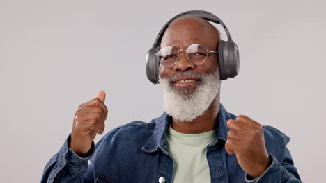 Senior,-black-man-and-dancing-with-headphones-to