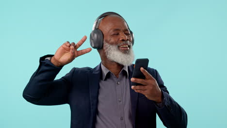 Phone,-music-headphones-and-mature-black-man-dance