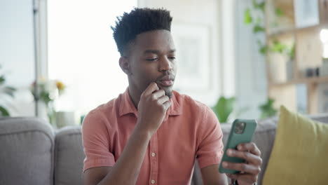 Home,-thinking-and-black-man-with-smartphone