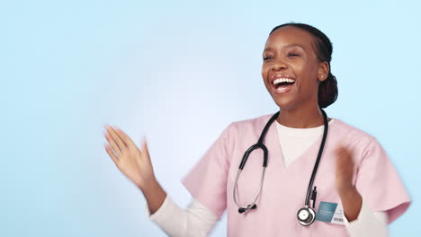Happy-black-woman,-doctor-and-applause-in-success