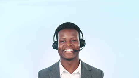 Black-man,-callcenter-consultant-pointing-up