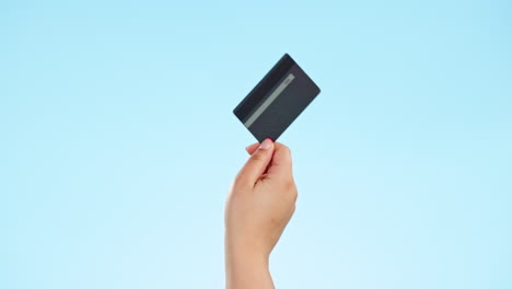 Credit-card,-payment-and-hand-of-person-in-studio