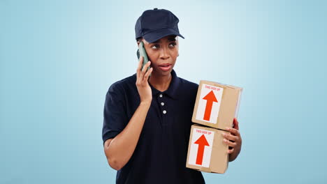 Delivery,-stress-and-phone-call-by-woman-in-studio