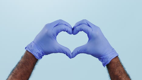 Closeup,-hands-and-gloves-with-healthcare