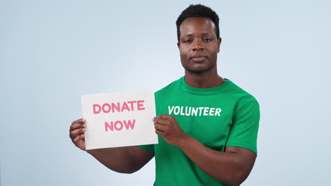 Volunteer,-black-man-and-face-with-donate-sign