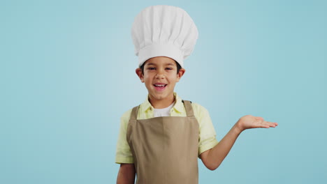 Niño,-Cara-Feliz-Y-Mano-De-Chef-Para-Mostrar-Promoción