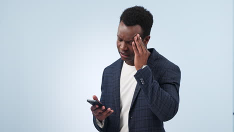 Phone,-stress-and-black-man-with-headache