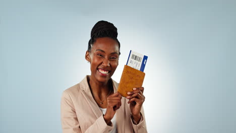 Happy-woman,-travel-and-ticket-in-studio-on-blue
