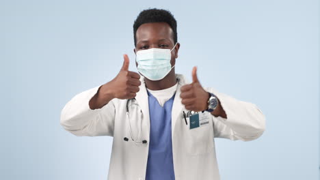 Face-mask,-doctor-and-black-man-with-thumbs-up