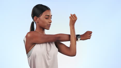 Stretching-arms,-fitness-and-Indian-woman