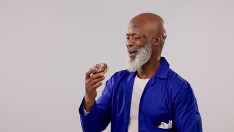 Senior-man,-mechanic-or-eating-donut-with-smile