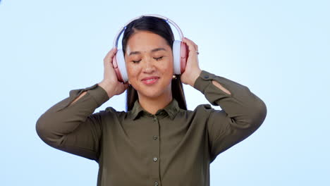 Music,-headphones-and-woman-dance-in-studio-happy