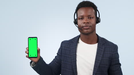 Black-man,-call-center-and-pointing-to-phone-green