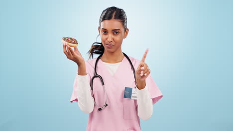 Woman-nurse-with-donut-and-no-gesture