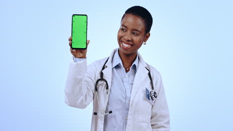 Cellphone,-green-screen-and-woman-doctor