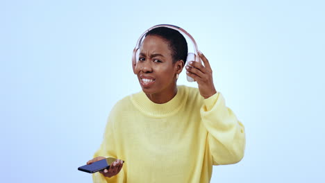 Question,-headphones-and-black-woman-listening-to