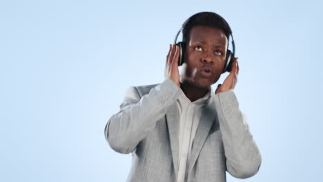 Black-man,-headphones-and-dancing-to-music