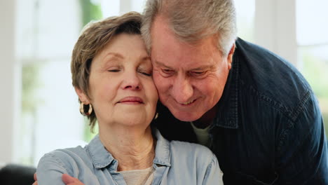 Senior-couple,-hug-and-relax-closeup-in-a-home
