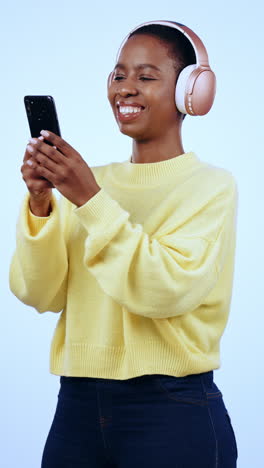 Black-woman,-headphones-or-phone-for-music-search