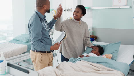 Doctor,-high-five-and-child-in-hospital