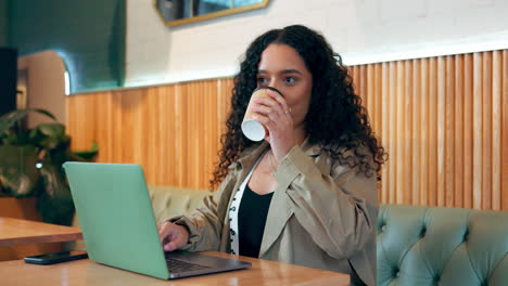 Woman,-remote-work-and-drink-in-coffee-shop