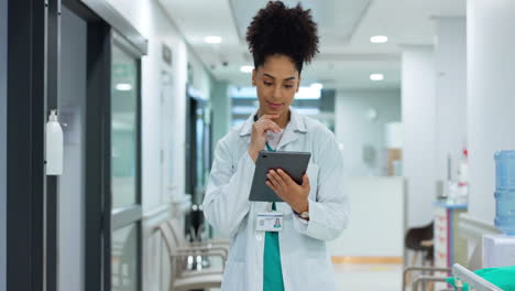 Typing,-tablet-or-doctor-in-hospital-with-research