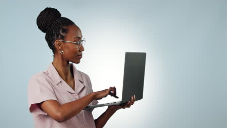 Laptop,-pointing-or-face-of-black-woman-in-studio