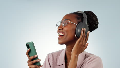 Singing,-phone-or-black-woman-listening-to-music