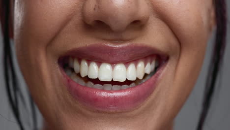 Woman,-mouth-and-closeup-in-studio-for-dental