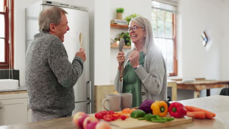 Bonding,-senior-couple-and-cooking-singing