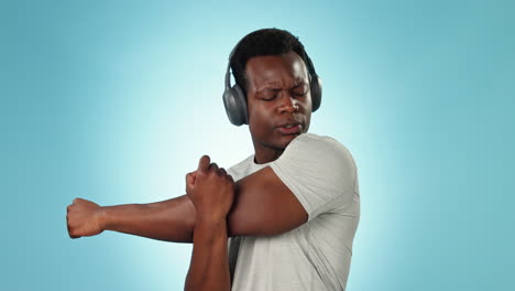 Man,-headphones-and-stretching-for-exercise