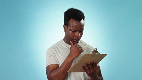 Thinking,-planning-and-a-black-man-reading-notes