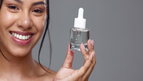 Woman,-serum-and-dropper-for-skincare