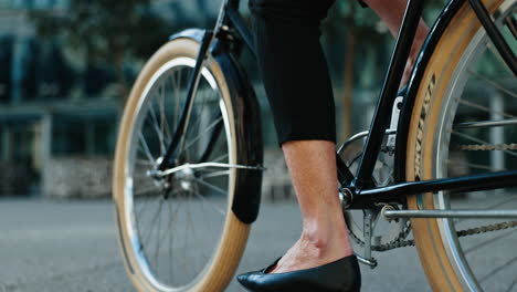 Cycling,-woman-and-feet-on-bike-for-travel