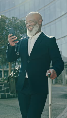 Businessman,-smartphone-and-luggage-in-city